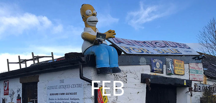 February features a fibreglass Homer Simpson on the roof of an antiques shop