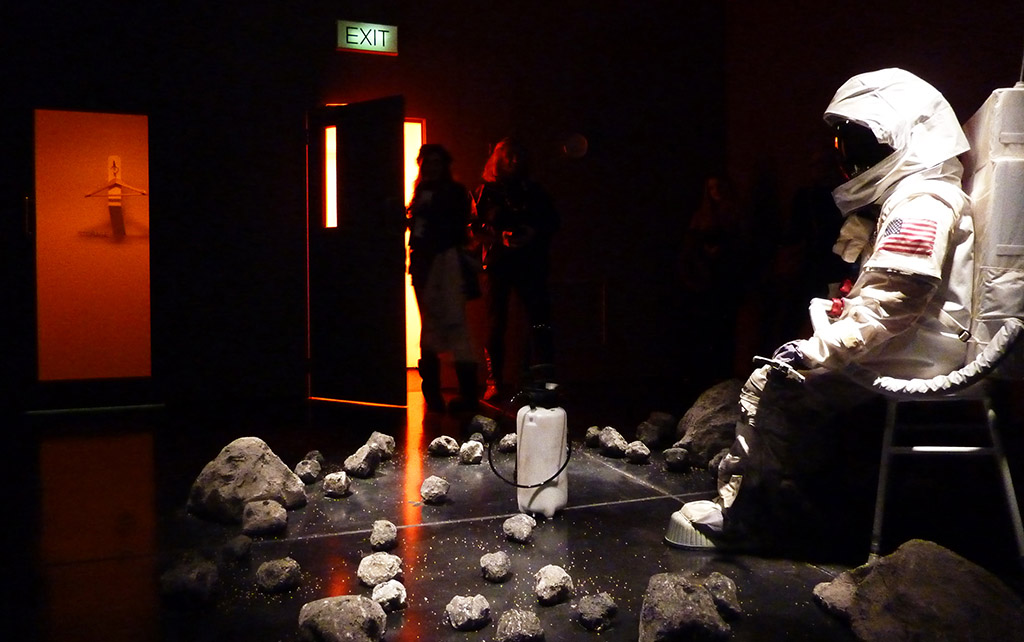 Republic of the Moon installation shot at FACT Liverpool featuring an astronaut and moon rocks