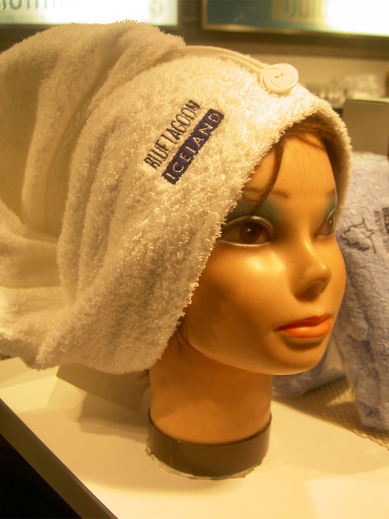 Blue Lagoon towel on the head of a female mannequin